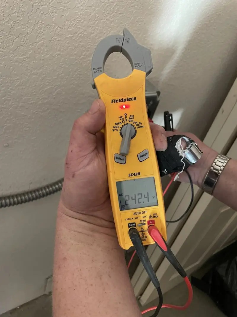 Voltage testing with clamp meter during Aluminum Wiring Replacement in Crockett